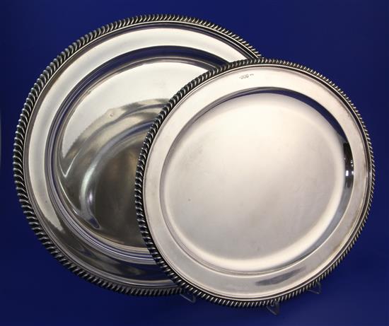 Two late Victorian silver graduated meat dishes by Mappin & Webb, 18.25in & 16in.